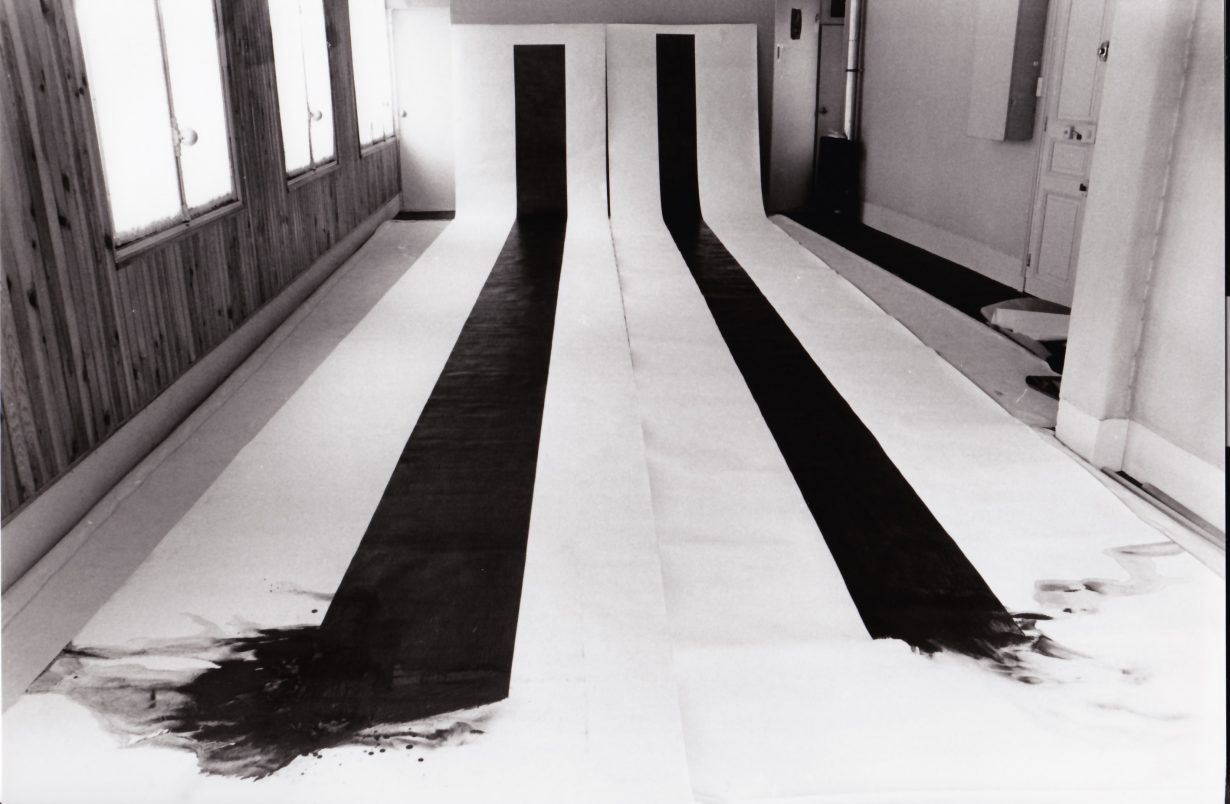 Photograph of Takesada Matsutani with his works Stream 1 & 2