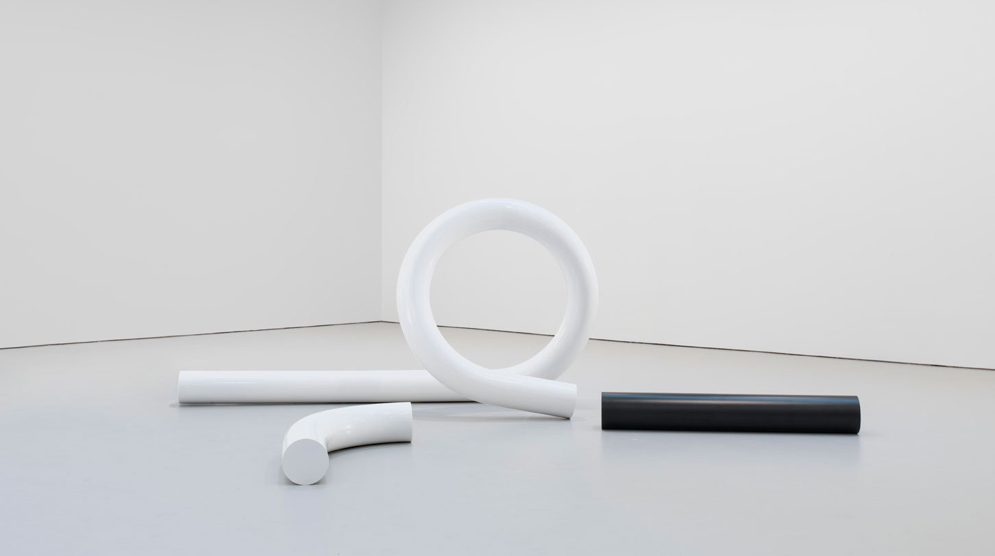 The White Tubular Glyph, 2012, powder coated bent steel, dimensions variable. Photo: EPW Studio/ Maris Hutchinson. Courtesy the artist, Maccarone, New York, and David Zwirner, New York & London