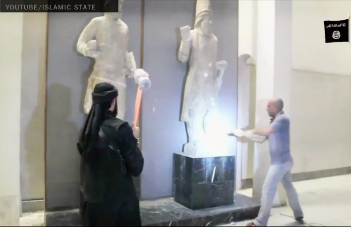 ISIS militants destroying Mosul Museum artifacts