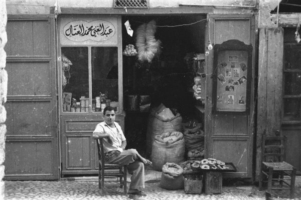 Hashem el Madani, Itinerary – Abdel-Ghani el-Attal next to his grocery shop in Haret el Keshek, Saïda, 1949, 2008. © the artist. Courtesy Hashem el Madani and Arab Image Foundation, Beirut