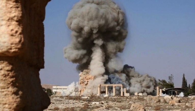 ISIS releases images of explosives and the destruction of the ancient Palmyra temple of Baalshamin, August 2015