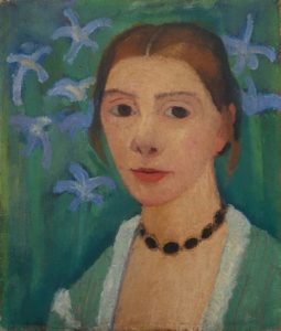 Paula Modersohn-Becker, Self-portrait with green background and blue irises, c.1905. AR April 2018 Book Review