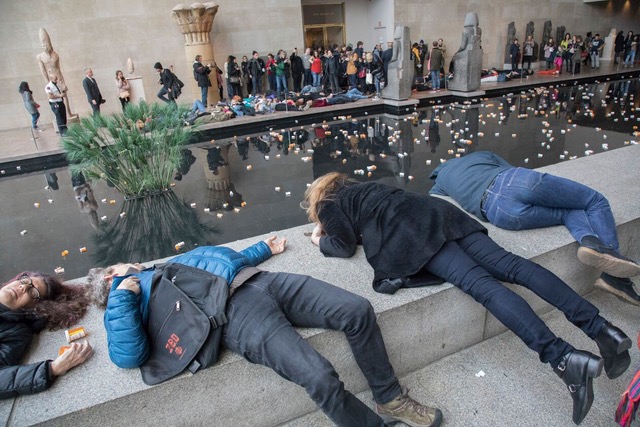 Photodocumentation of Nan Goldin and P.A.I.N.’s opioids protest in the Metropolitan Museum of Art’s Sackler Wing, New York, 2018. AR September 2018 Feature