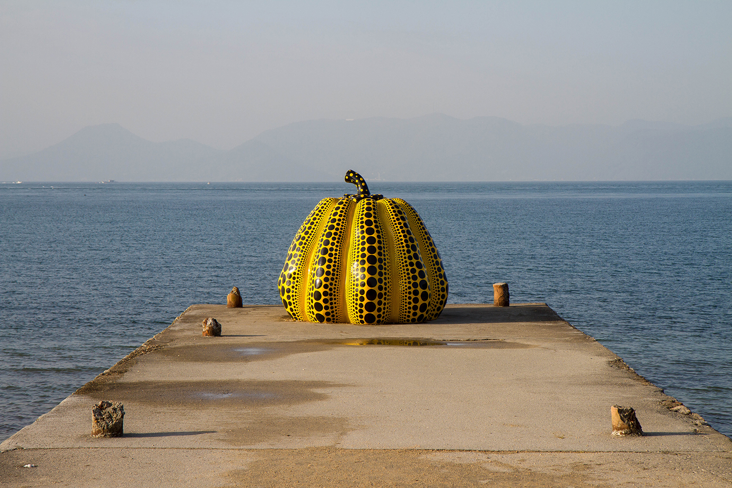 Yayoi Kusama's 'Yellow Pumpkin' sculpture returned to its perch on