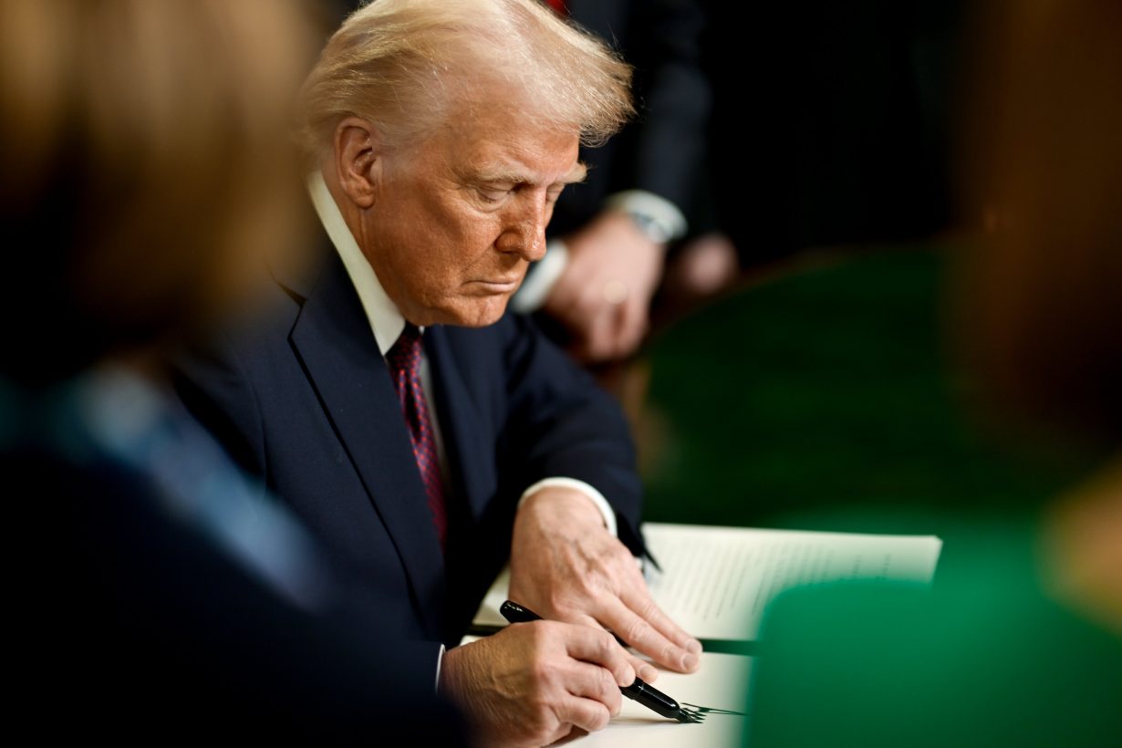 President Donald Trump displaying signed executive orders. Photo: The Trump White House, Public domain, via Wikimedia Commons