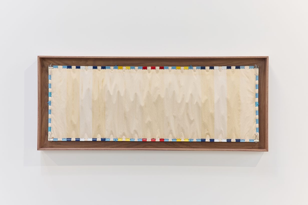 A rectangular work with faint stripes