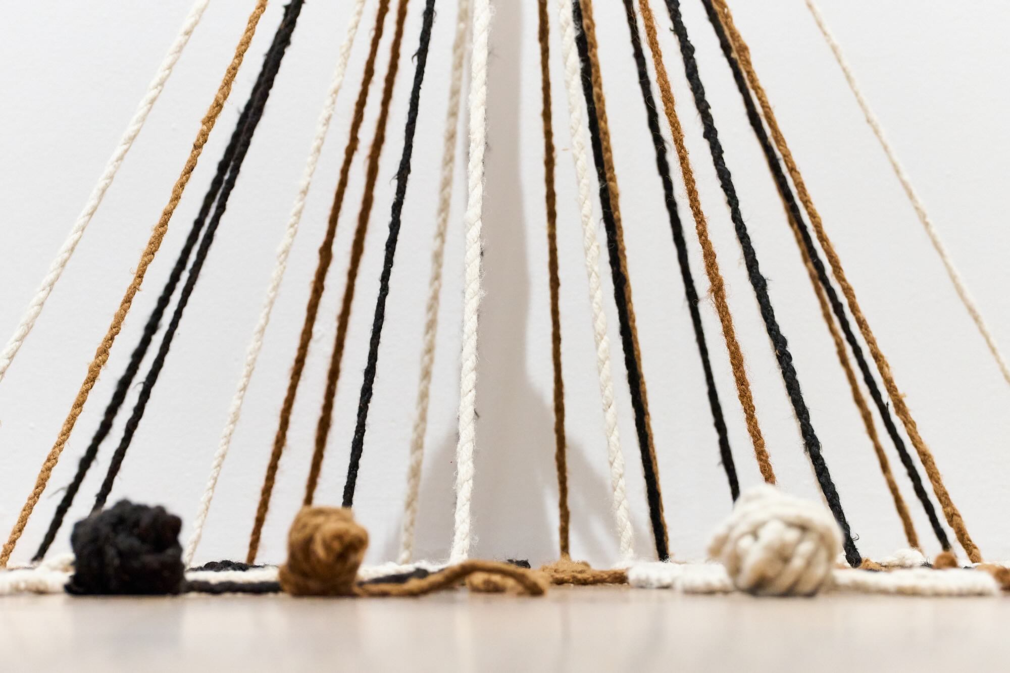 Rope tied to the floor in different colours