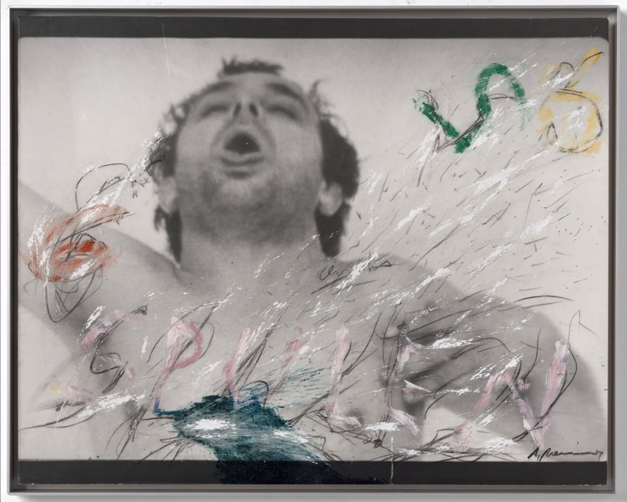 Artwork by Arnulf Rainer, in which a photographic self-portrait of the artist with an ecstatic expression has been over painted with the SPULEN and various gestural marks