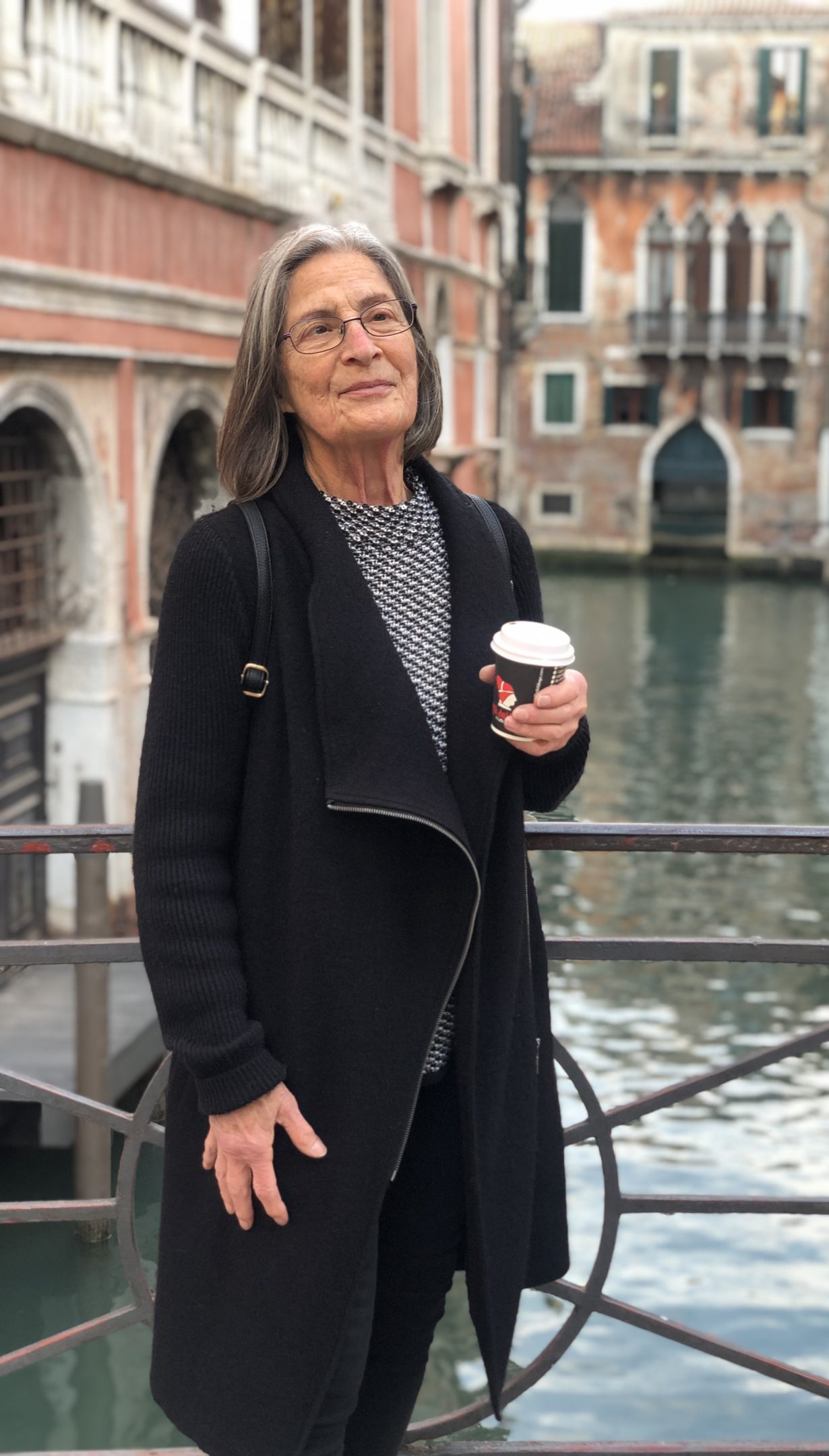 Photo of Katherine El-Salahi on a bridge over a Venice canal