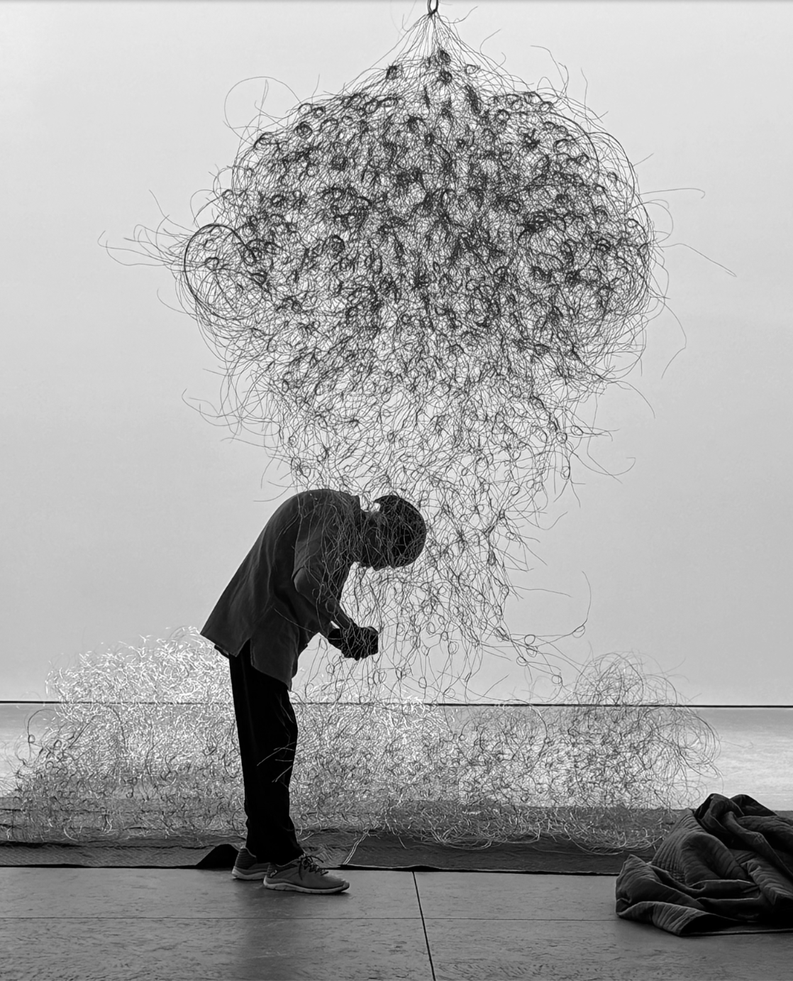 Alan Saret working on his sculpture Two to Ten Rising at Karma, New York, 2025.