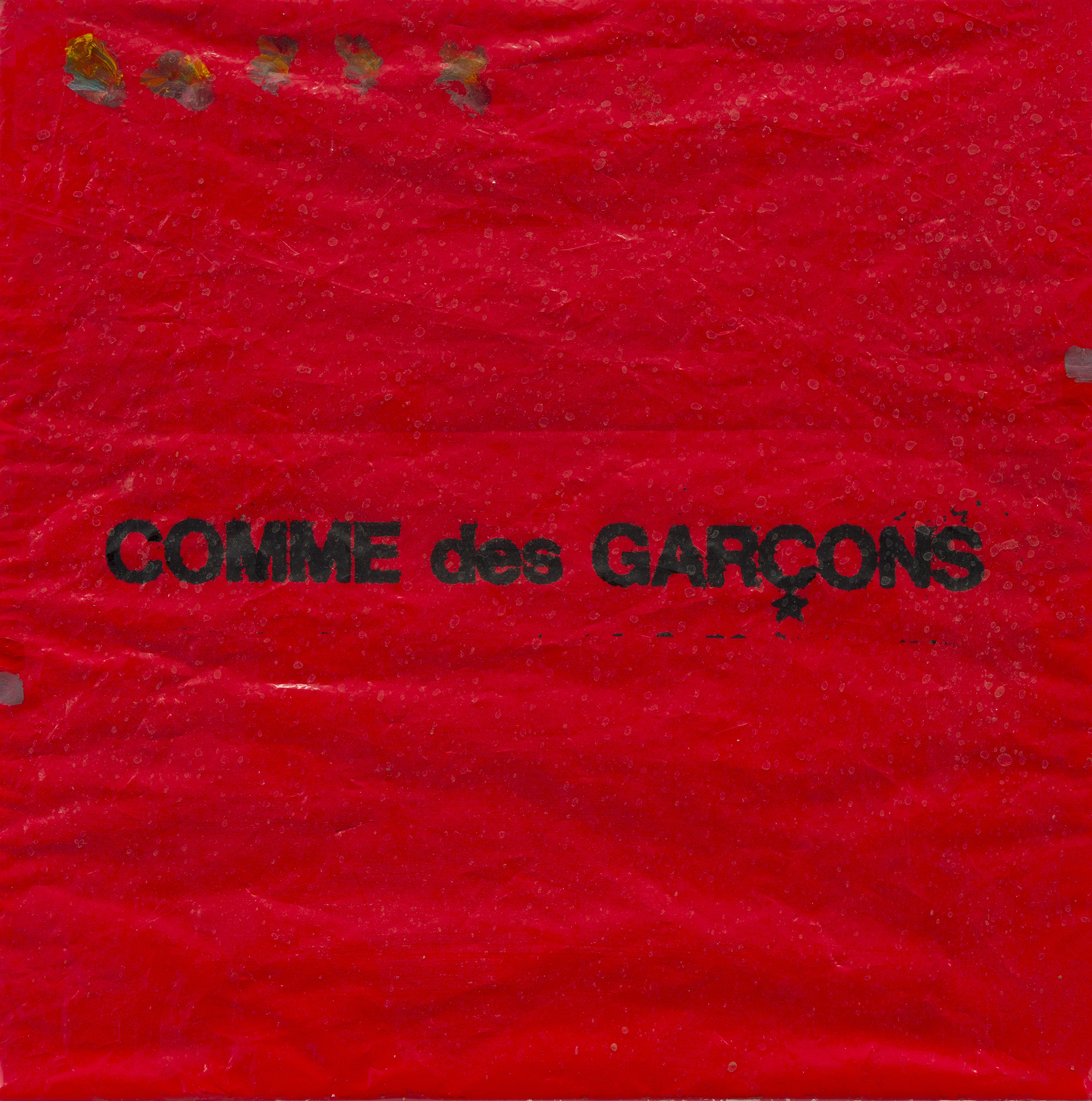 Tam Ochiai, Comme Des Garçons, 1992, acrylic on shopping bag, vinyl, 28 × 28 cm. Photo: Stephen Faught. Courtesy Ulrik, New York